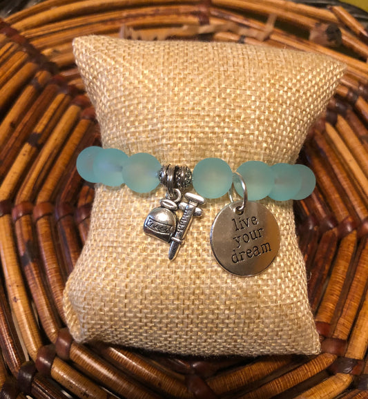 Nurse Powder Blue Frosted Charmed Bracelet